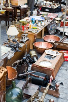a pile of antiques outside house clearance shop